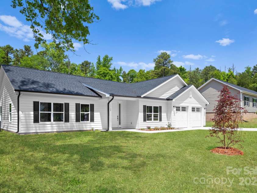 13109 Homewood Drive, Charlotte, NC 28262.  MLS# CAR4254239, YatesRealty ID 30473. Front of the House