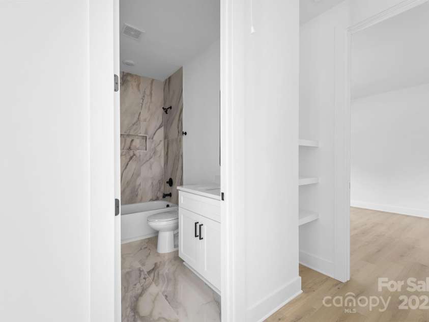13109 Homewood Drive, Charlotte, NC 28262.  MLS# CAR4254239, YatesRealty ID 30473. Hallway - Bathroom