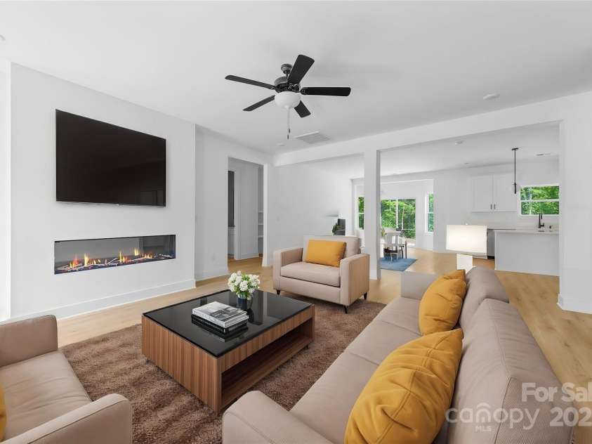 13109 Homewood Drive, Charlotte, NC 28262.  MLS# CAR4254239, YatesRealty ID 30473. Virtual Staging - Living room