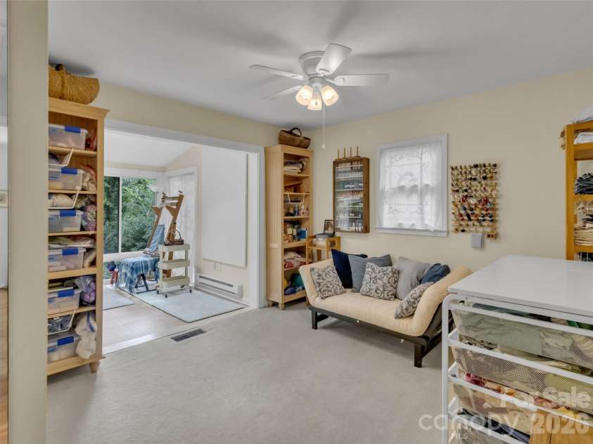 228 Crescent Drive, Lake Junaluska, NC 28745.  MLS# CAR4391043, YatesRealty ID 30475. 2nd Bdrm flows into sunroom