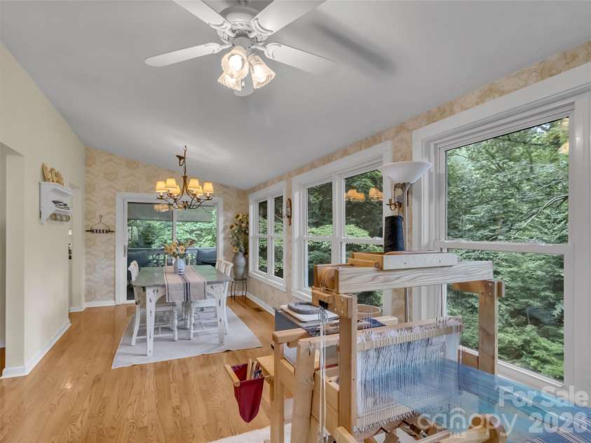 228 Crescent Drive, Lake Junaluska, NC 28745.  MLS# CAR4391043, YatesRealty ID 30475. Dining Rm with wall of windows