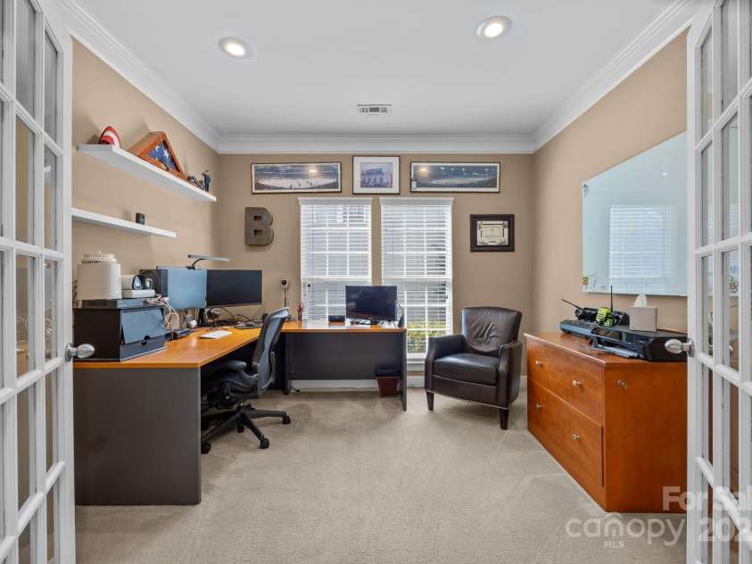 6703 Garden Hill Drive, Huntersville, NC 28078.  MLS# CAR4265776, YatesRealty ID 30476. Office with French doors, recessed lighting, and crown molding detail