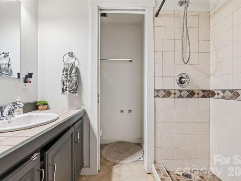 1177 Runway Drive, Hendersonville, NC 28792.  MLS# CAR4381042, YatesRealty ID 30483. Ensuite bathroom