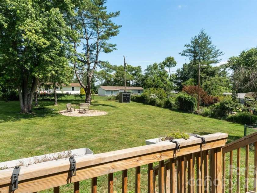 1177 Runway Drive, Hendersonville, NC 28792.  MLS# CAR4381042, YatesRealty ID 30483. Huge back yard