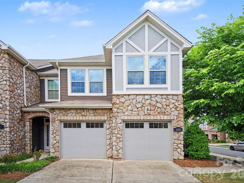 1029 Archibald Avenue, Fort Mill, SC 29708.  MLS# CAR4377512, YatesRealty ID 30486. Oversized 2-car Garage side view