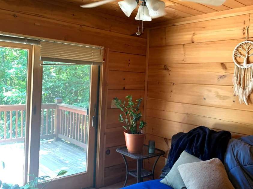 453 Grandview Peaks Drive, Nebo, NC 28761.  MLS# CAR4368502, YatesRealty ID 30490. Bedroom 2 opens to deck