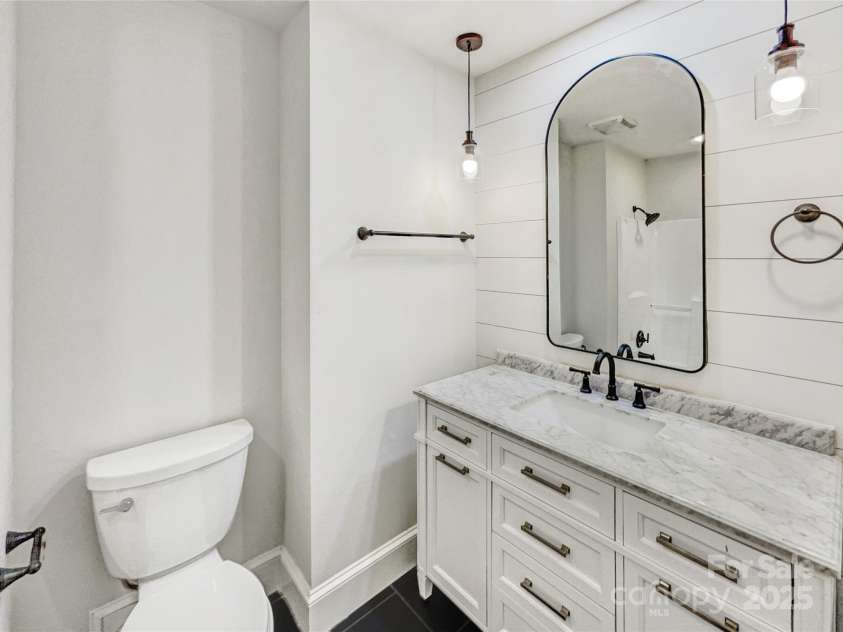 8117 Shannon Woods Lane, Matthews, NC 28104.  MLS# CAR4285282, YatesRealty ID 30495. 