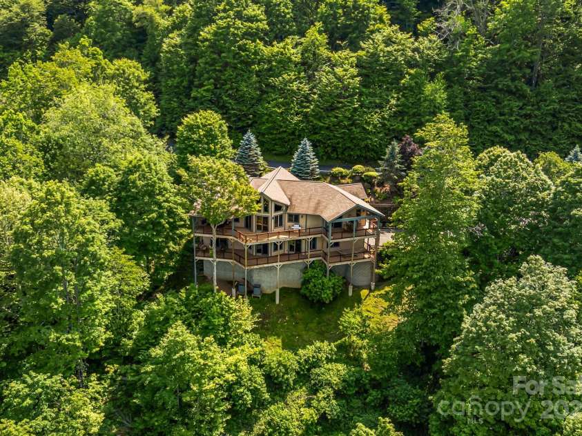 197 Cherry Knob Drive, Mars Hill, NC 28754.  MLS# CAR4271284, YatesRealty ID 30496. Elevated mountain living with full-length covered outdoor areas on both levels