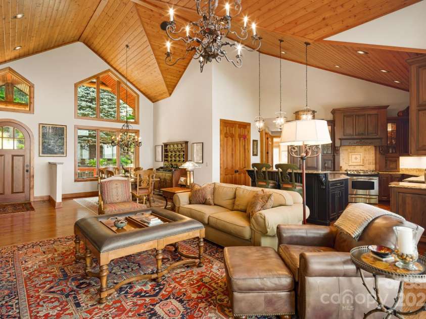 197 Cherry Knob Drive, Mars Hill, NC 28754.  MLS# CAR4271284, YatesRealty ID 30496. Stunning open-concept design unites the great room, dining area, and chef’s kitchen beneath soaring vaulted ceilings with rich wood accents.