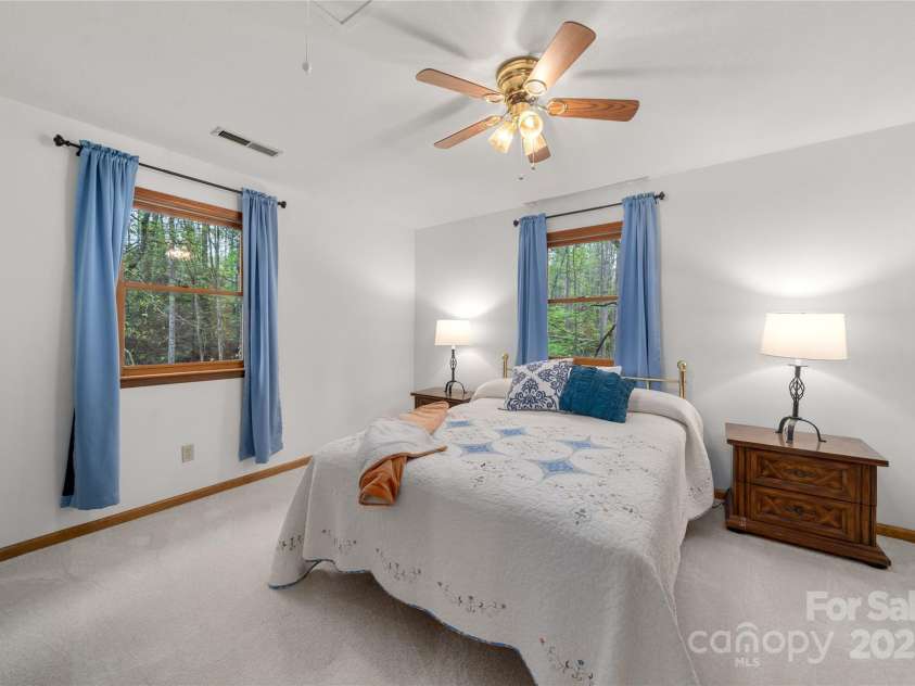17 Morris Drive, Weaverville, NC 28787.  MLS# CAR4222234, YatesRealty ID 30498. Bedroom #3: Two large windows allow ample natural light to fill the room. The room can be used as a guest or children's room.