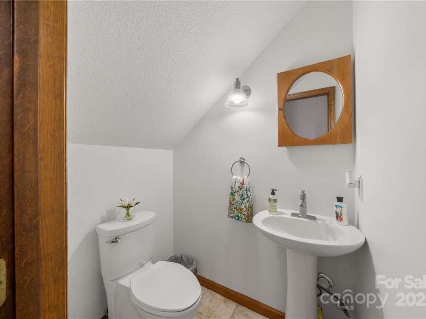 17 Morris Drive, Weaverville, NC 28787.  MLS# CAR4222234, YatesRealty ID 30498. Half Bath Downstairs 