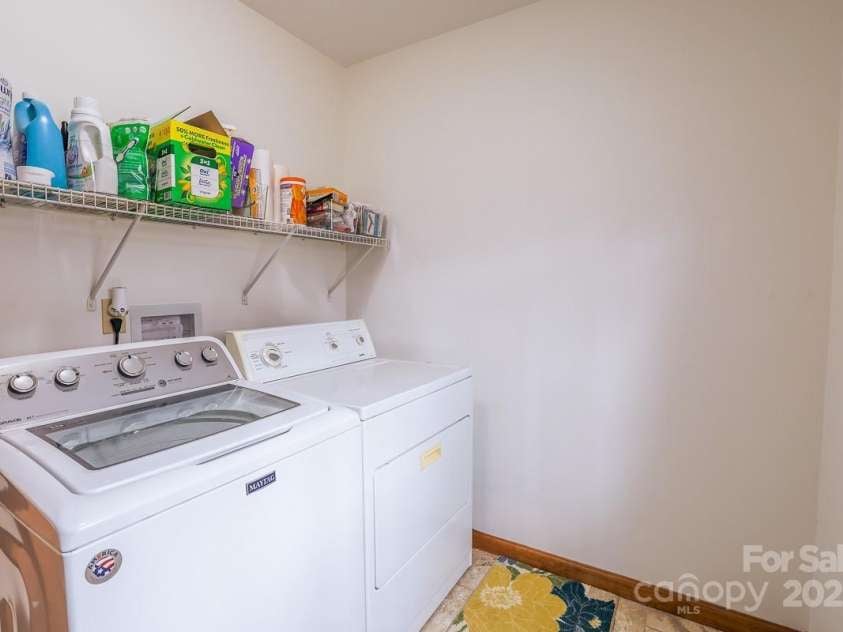 17 Morris Drive, Weaverville, NC 28787.  MLS# CAR4222234, YatesRealty ID 30498. Off the kitchen is a laundry room and a pantry.