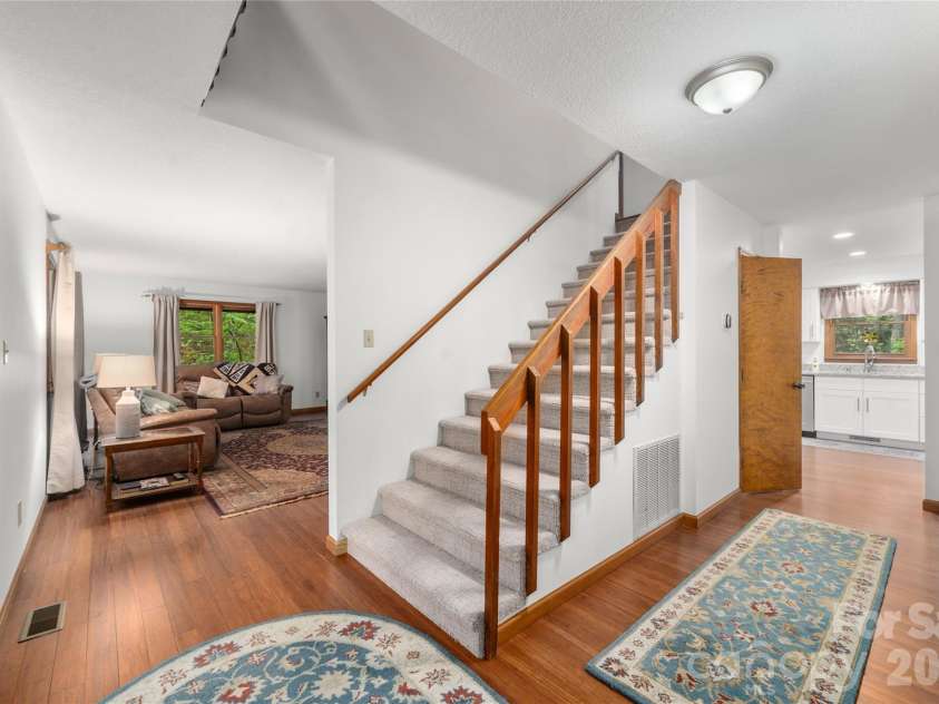 17 Morris Drive, Weaverville, NC 28787.  MLS# CAR4333064, YatesRealty ID 30498. Front Door Entrance to your Home Leading to the Kitchen, Living Room, Den, Kitchen and Dining Area