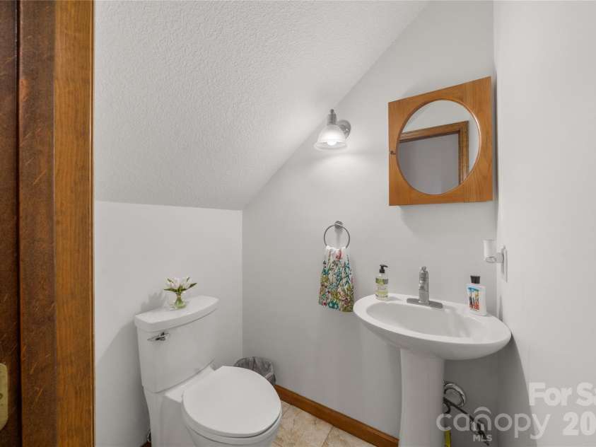 17 Morris Drive, Weaverville, NC 28787.  MLS# CAR4333064, YatesRealty ID 30498. Half Bath Downstairs 