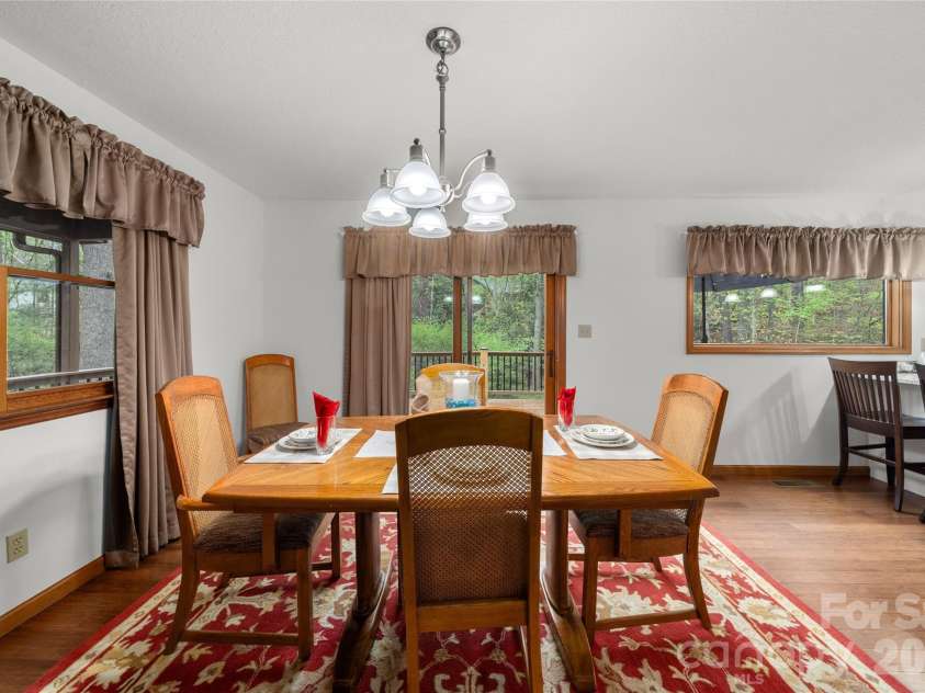 17 Morris Drive, Weaverville, NC 28787.  MLS# CAR4333064, YatesRealty ID 30498. Sit down and eat a meal with family and friends. It could be a holiday meal, Thanksgiving or a potluck. Or it could be a family that enjoys having meals together. 