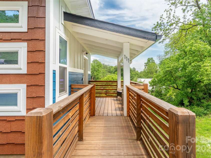 109 Thurland Avenue, Asheville, NC 28803.  MLS# CAR4261311, YatesRealty ID 30501. Covered ADU porch