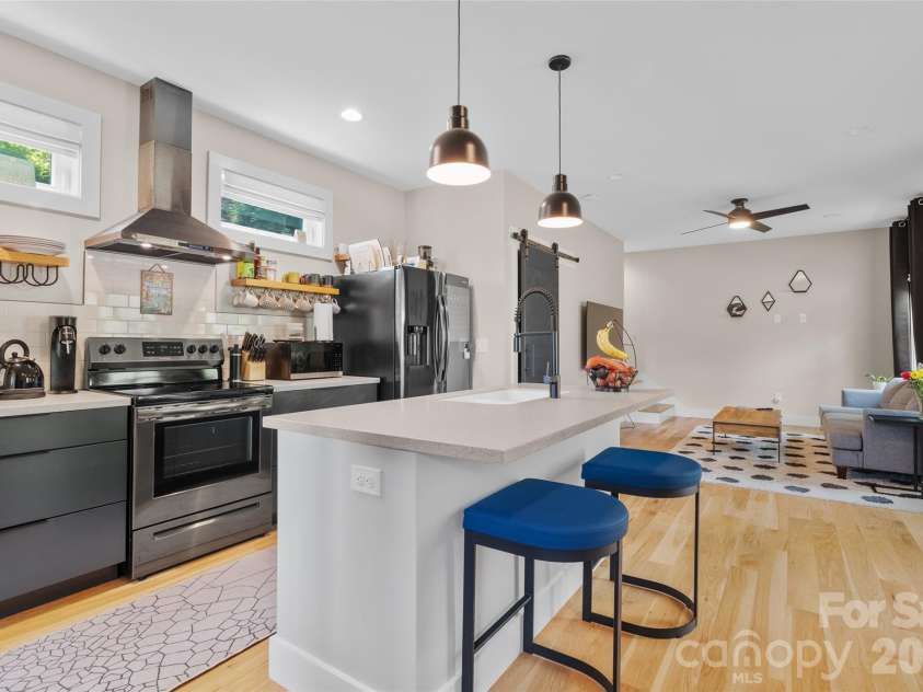 109 Thurland Avenue, Asheville, NC 28803.  MLS# CAR4261311, YatesRealty ID 30501. Main house kitchen open to living space