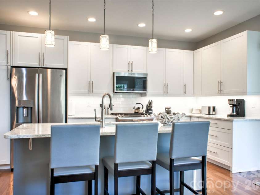22 Water Pointe Way, Weaverville, NC 28787.  MLS# CAR4388539, YatesRealty ID 30505. Enjoy breakfast at the bar