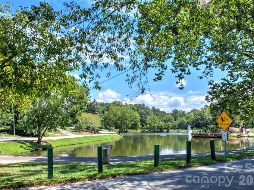 22 Water Pointe Way, Weaverville, NC 28787.  MLS# CAR4388539, YatesRealty ID 30505. Imagine walks around the lake just steps from your home