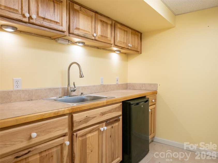 40 Applecross Road, Weaverville, NC 28787.  MLS# CAR4383217, YatesRealty ID 30515. Basement kitchenette