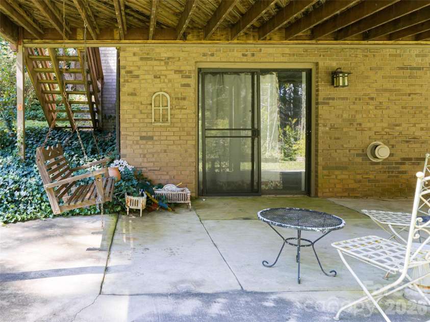 40 Applecross Road, Weaverville, NC 28787.  MLS# CAR4383217, YatesRealty ID 30515. Patio off lower level