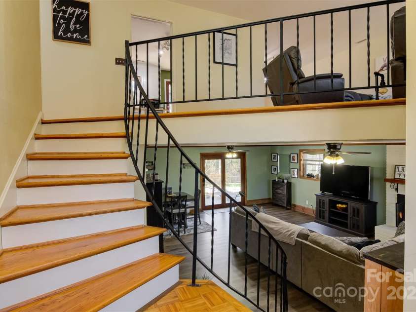 5230 Northview Drive, Hickory, NC 28601.  MLS# CAR4233667, YatesRealty ID 3052. Curved staircase is a unique feature