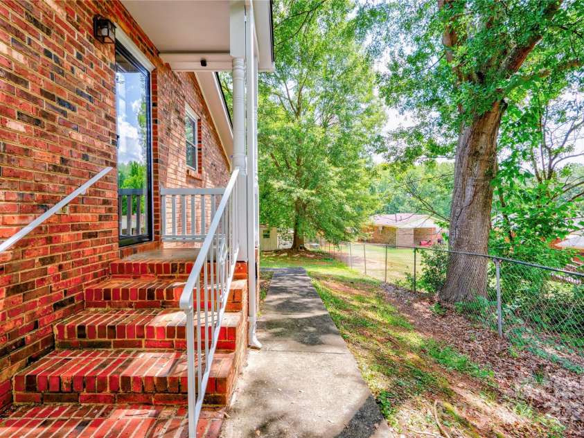 1153 Woodhill Drive, Shelby, NC 28152.  MLS# CAR4284327, YatesRealty ID 30524. Covered Side Porch