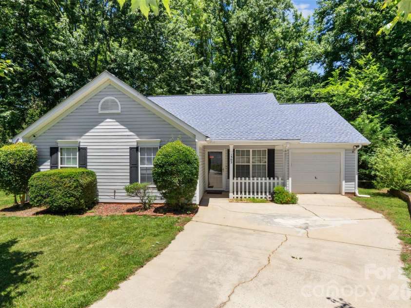 1303 Long Grass Court, Charlotte, NC 28216.  MLS# CAR4390381, YatesRealty ID 30525. 