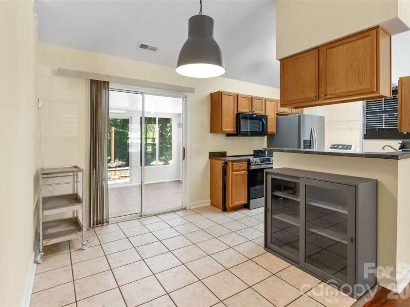 1303 Long Grass Court, Charlotte, NC 28216.  MLS# CAR4390381, YatesRealty ID 30525. 