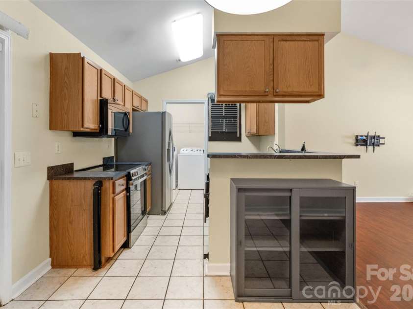 1303 Long Grass Court, Charlotte, NC 28216.  MLS# CAR4390381, YatesRealty ID 30525. 
