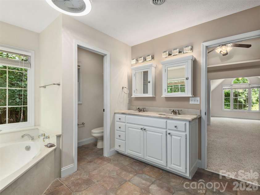 48 Smokemont Drive, Arden, NC 28704.  MLS# CAR4381980, YatesRealty ID 30527. Primary bath with double vanity