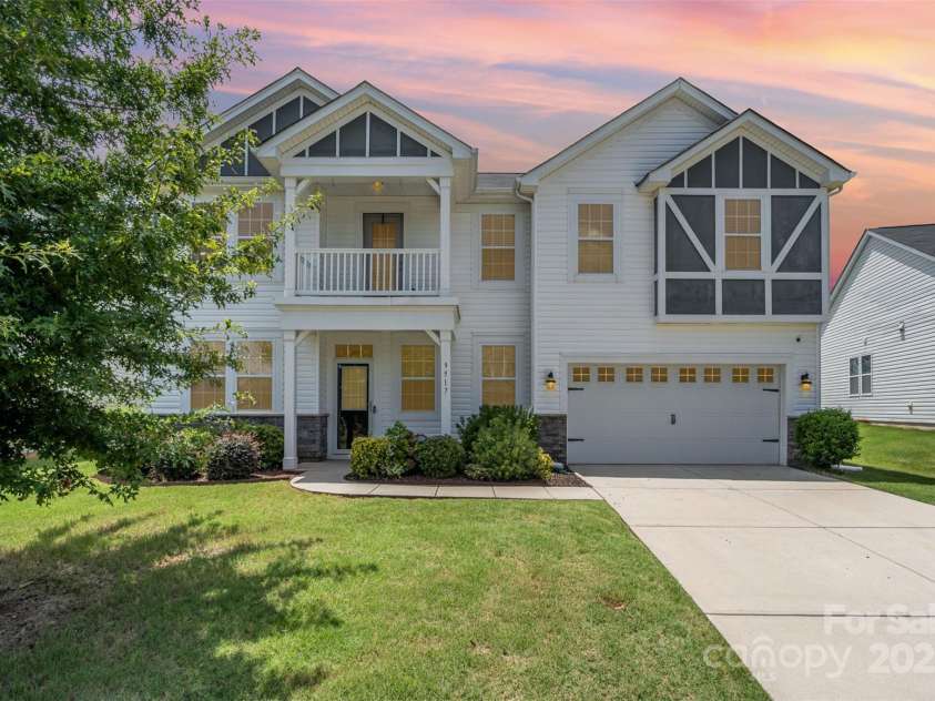9517 Silverdale Lane, Charlotte, NC 28269.  MLS# CAR4280714, YatesRealty ID 30527. Front Exterior Twilight