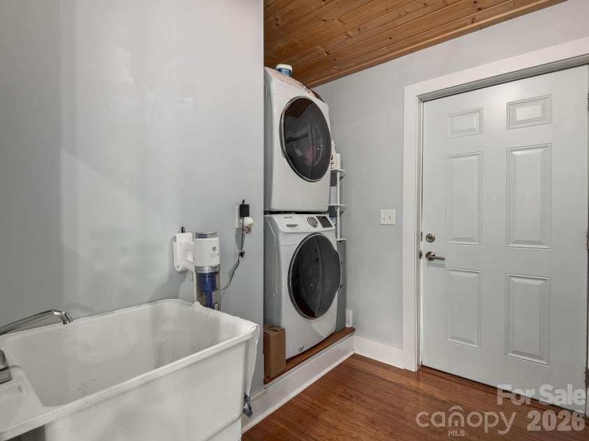 63 Beverly Road, Asheville, NC 28806.  MLS# CAR4386493, YatesRealty ID 30529. Mudroom with stackable washer/dryer and sink