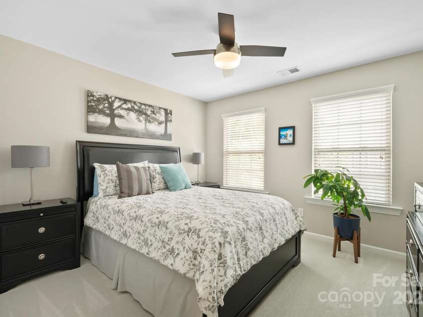 7322 Dulnian Way, Charlotte, NC 28278.  MLS# CAR4272540, YatesRealty ID 30530. Bedroom 2 with ceiling fan.