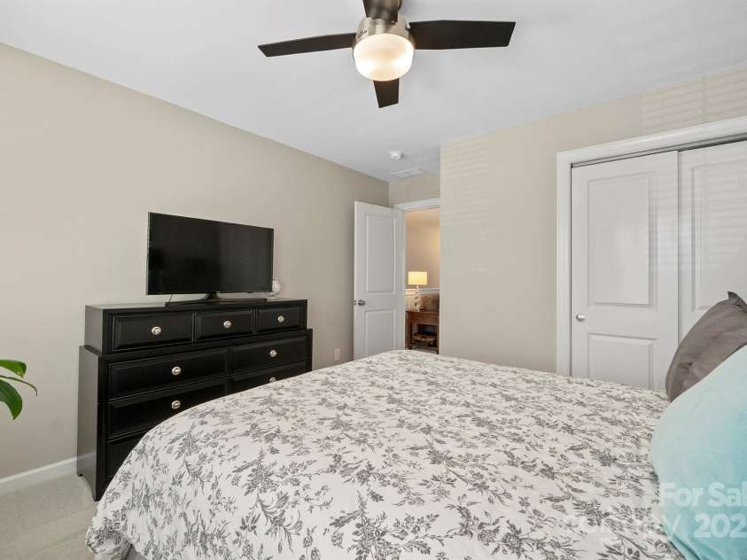7322 Dulnian Way, Charlotte, NC 28278.  MLS# CAR4272540, YatesRealty ID 30530. Bedroom 2 with ceiling fan.