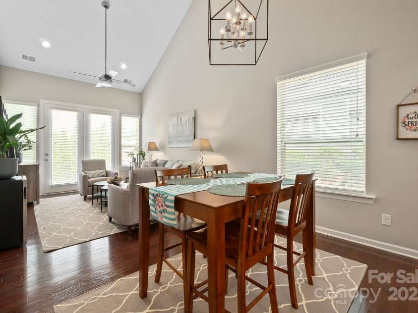 7322 Dulnian Way, Charlotte, NC 28278.  MLS# CAR4272540, YatesRealty ID 30530. Dining area with updated light fixture.