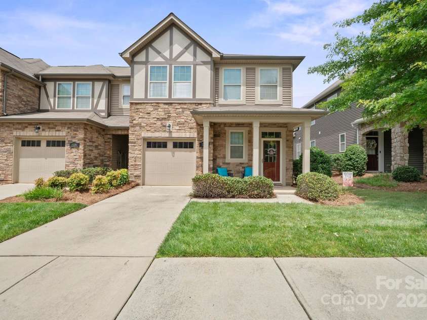 7322 Dulnian Way, Charlotte, NC 28278.  MLS# CAR4272540, YatesRealty ID 30530. End unit with cozy front porch and tons of light.