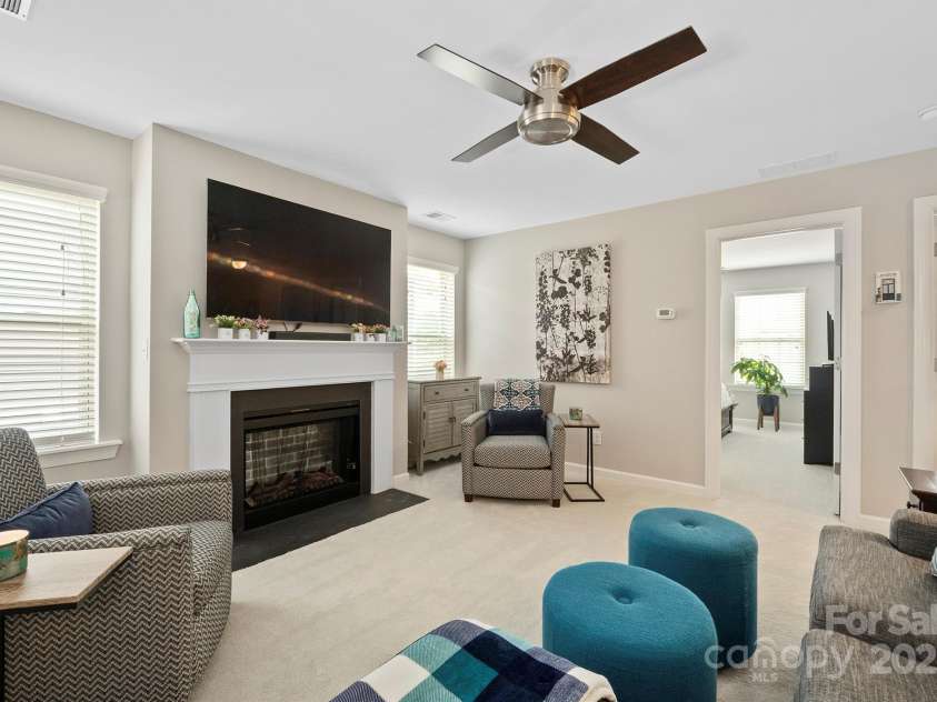 7322 Dulnian Way, Charlotte, NC 28278.  MLS# CAR4272540, YatesRealty ID 30530. Generous sized loft with fireplace overlooking