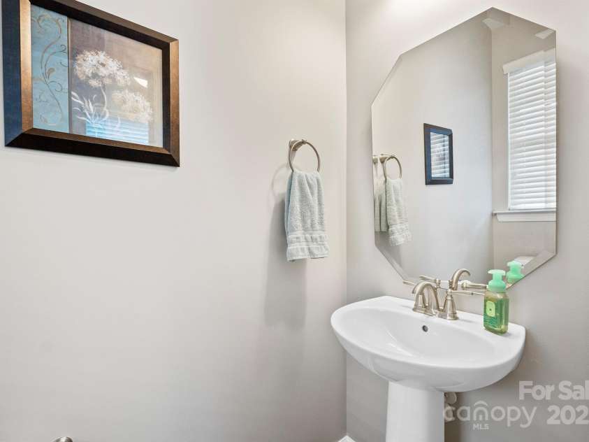 7322 Dulnian Way, Charlotte, NC 28278.  MLS# CAR4272540, YatesRealty ID 30530. Powder room downstairs for your guest.