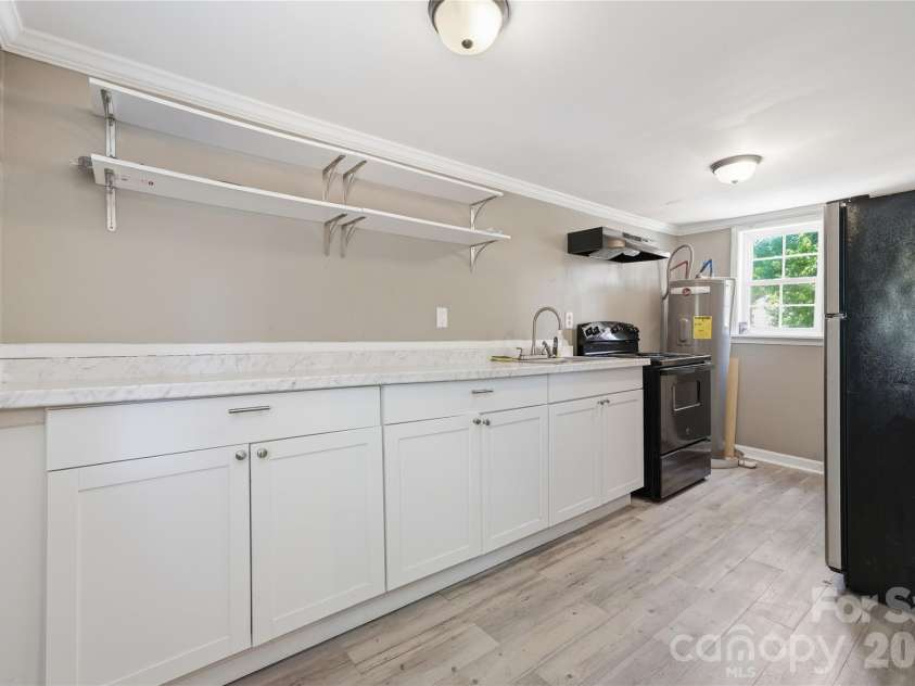 933 Rowan Street, Charlotte, NC 28208.  MLS# CAR4391506, YatesRealty ID 30535. 