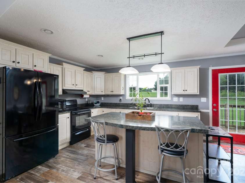 131 Brown Farms Drive, Cleveland, NC 27013.  MLS# CAR4278638, YatesRealty ID 30536. Lots of cabinets and center island