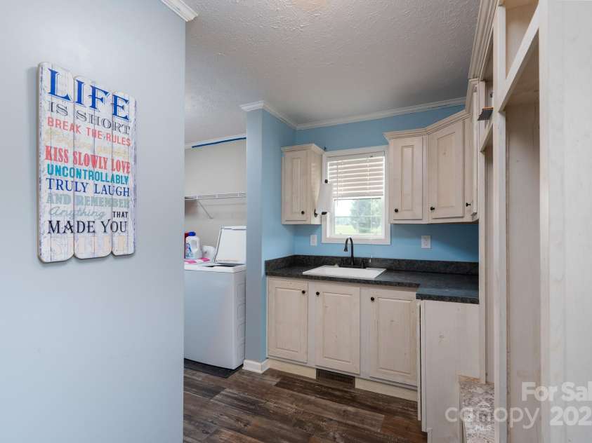 131 Brown Farms Drive, Cleveland, NC 27013.  MLS# CAR4278638, YatesRealty ID 30536. Mudroom with sink and storage. Located to the right when coming in the side door.