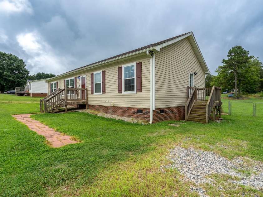 131 Brown Farms Drive, Cleveland, NC 27013.  MLS# CAR4278638, YatesRealty ID 30536. Side porch and door
