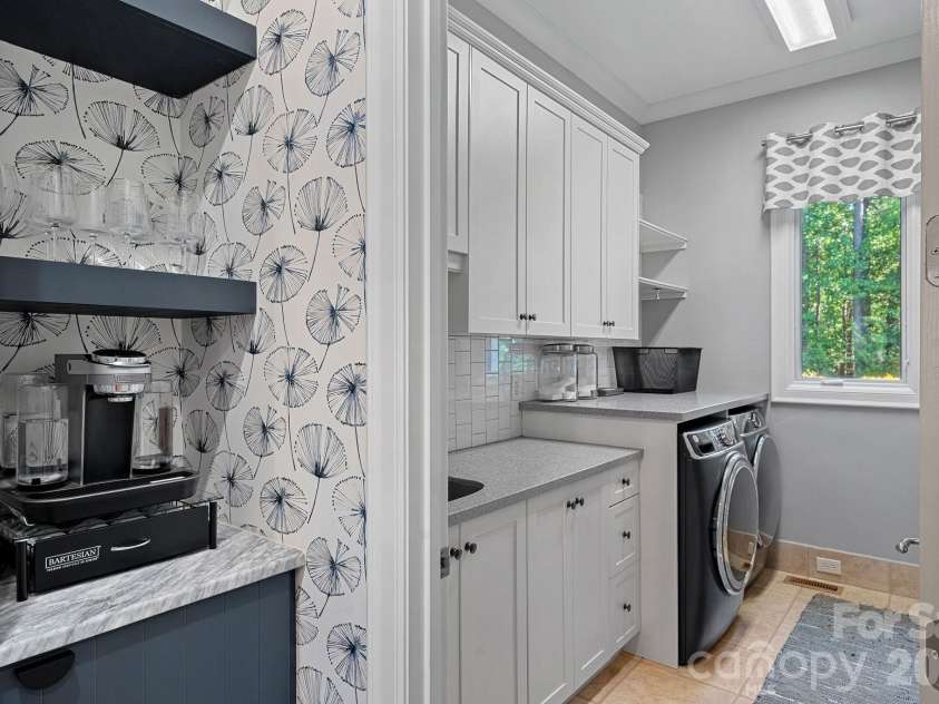 104 Maddaket Loop, Mooresville, NC 28117.  MLS# CAR4373825, YatesRealty ID 30540. Coffee Bar Niche and Laundry Room