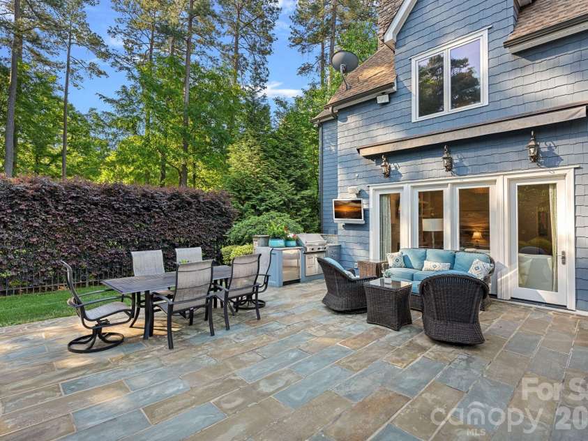 104 Maddaket Loop, Mooresville, NC 28117.  MLS# CAR4373825, YatesRealty ID 30540. Patio with Outdoor Kitchen and Retractable Awning