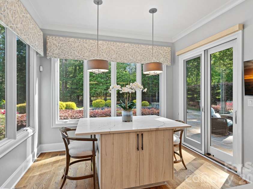 104 Maddaket Loop, Mooresville, NC 28117.  MLS# CAR4373825, YatesRealty ID 30540. Sunny Breakfast Area Overlooking Pool and Back Yard