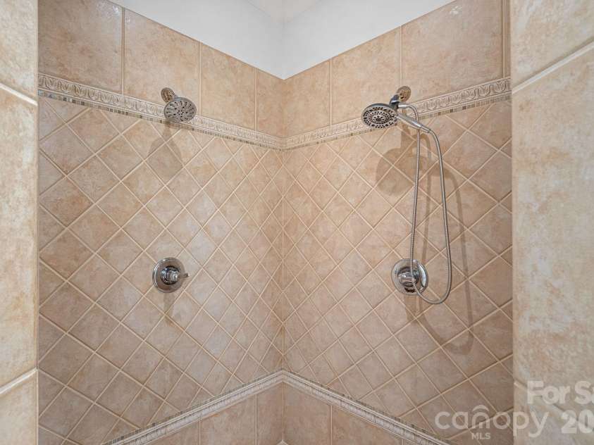 104 Maddaket Loop, Mooresville, NC 28117.  MLS# CAR4373825, YatesRealty ID 30540. Tiled Shower