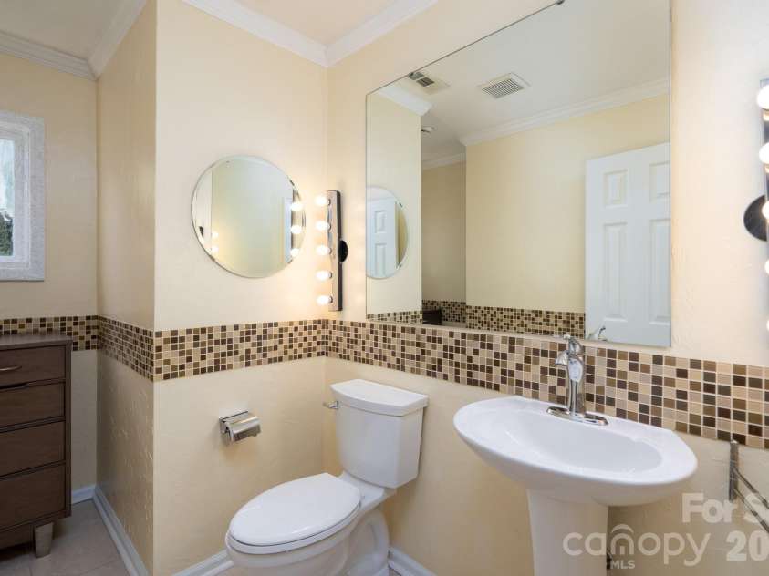 11220 Shandon Way Lane, Charlotte, NC 28262.  MLS# CAR4391284, YatesRealty ID 30541. Half bath main level