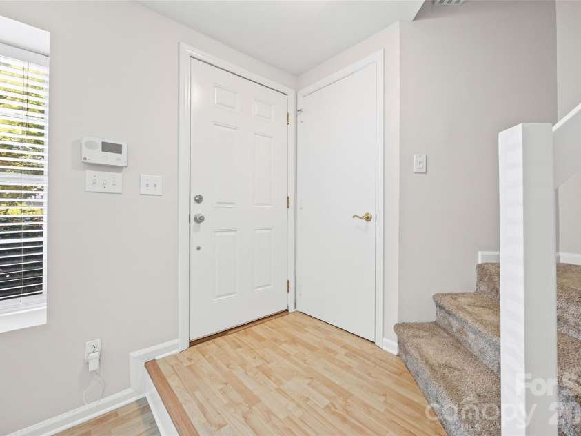 8117 Circle Tree Lane, Charlotte, NC 28277.  MLS# CAR4383359, YatesRealty ID 30542. Entryway with coat closet