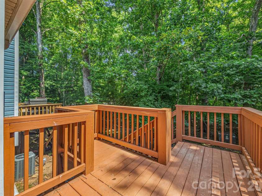 8117 Circle Tree Lane, Charlotte, NC 28277.  MLS# CAR4383359, YatesRealty ID 30542. Rear deck backs up to woods and golf course